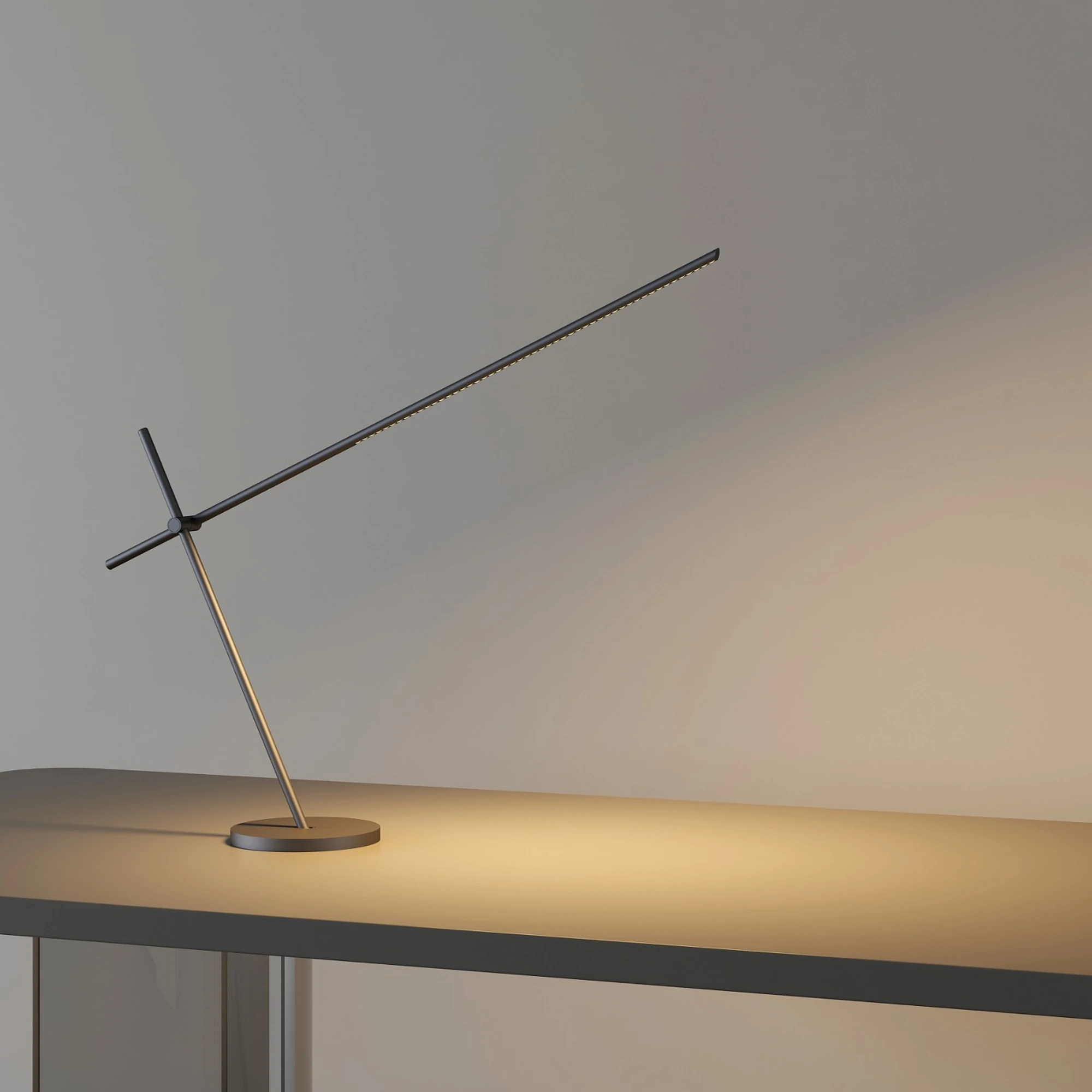 Graphite Crane Table Lamp — سلسلة Crane · مصباح طاولة بذراع متوازن — Graphite
